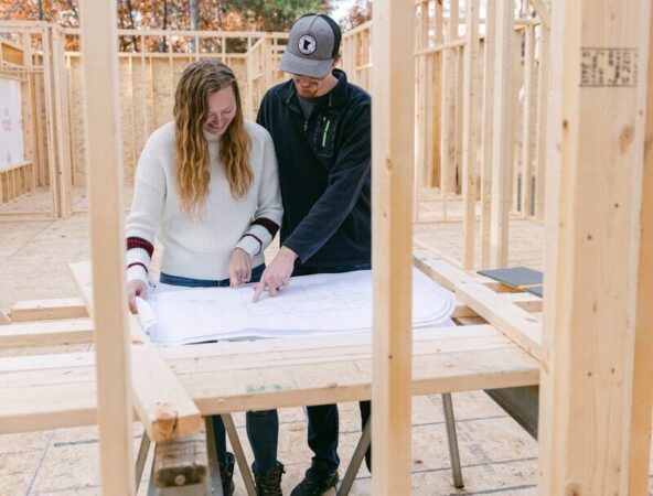 a man and a woman are sitting at a table