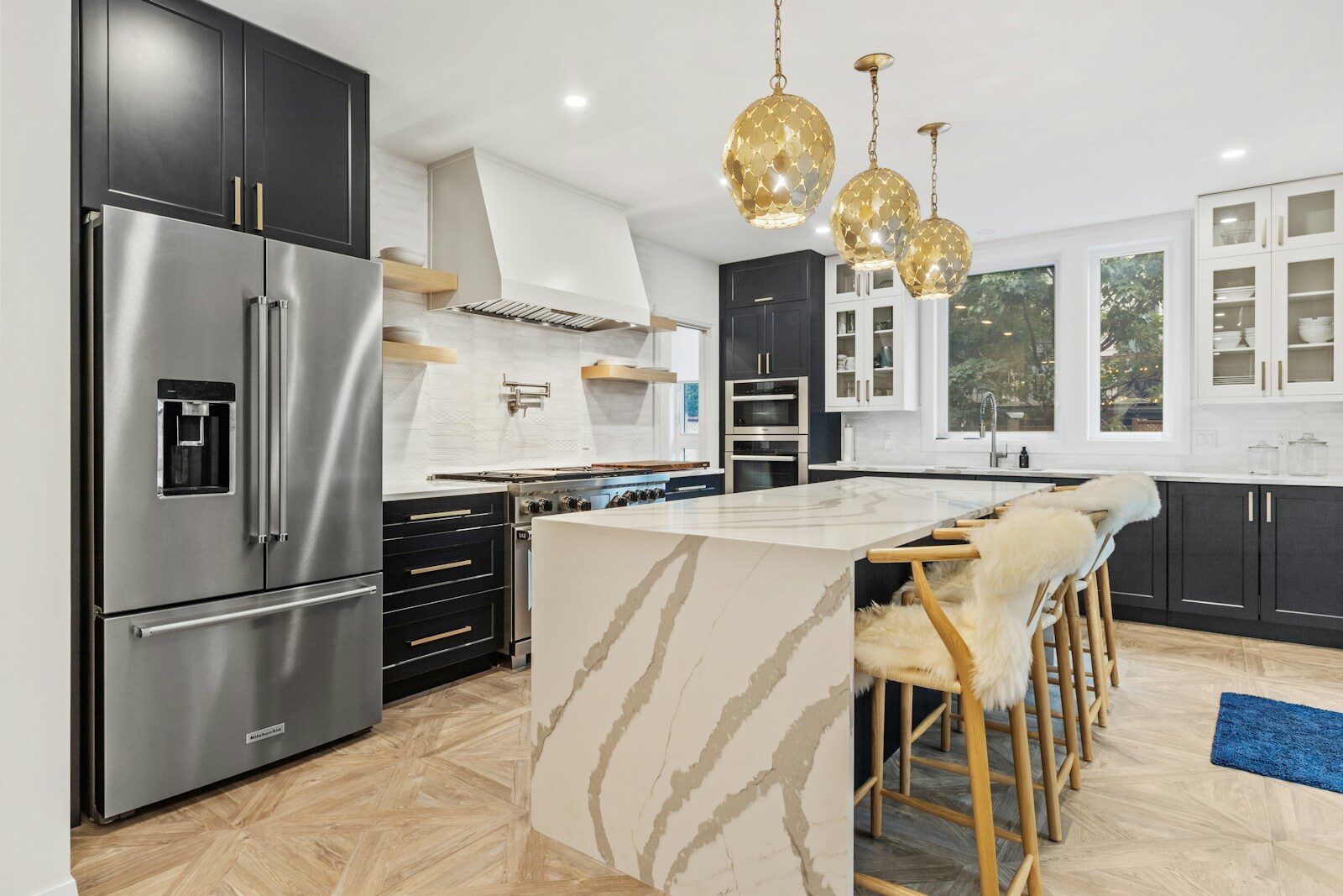 Photo by Point3D Commercial Imaging Ltd. silver french door refrigerator beside white wooden table